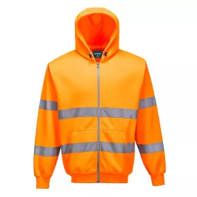 A sárga színű Hi-Vis cipzárós pulóver színe erőteljes kontrasztban áll a városi és ipari környezet szürke-fekete hátterével.