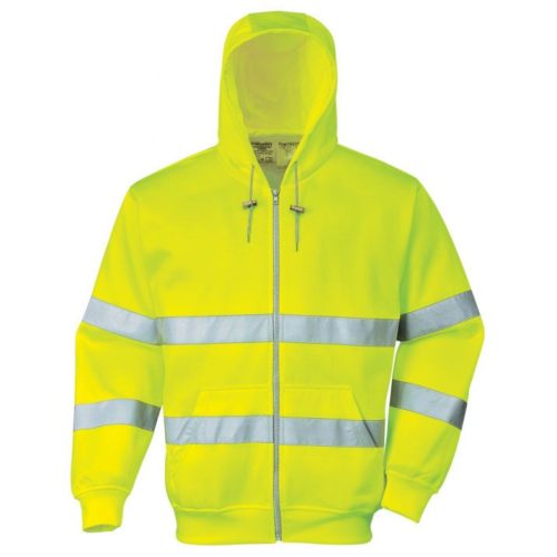 A sárga színű Hi-Vis cipzárós pulóver színe erőteljes kontrasztban áll a városi és ipari környezet szürke-fekete hátterével.